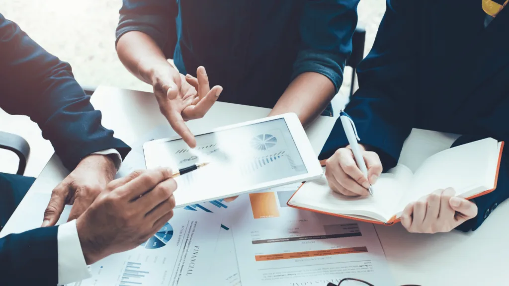 Team discussing pros and cons of AI customer support