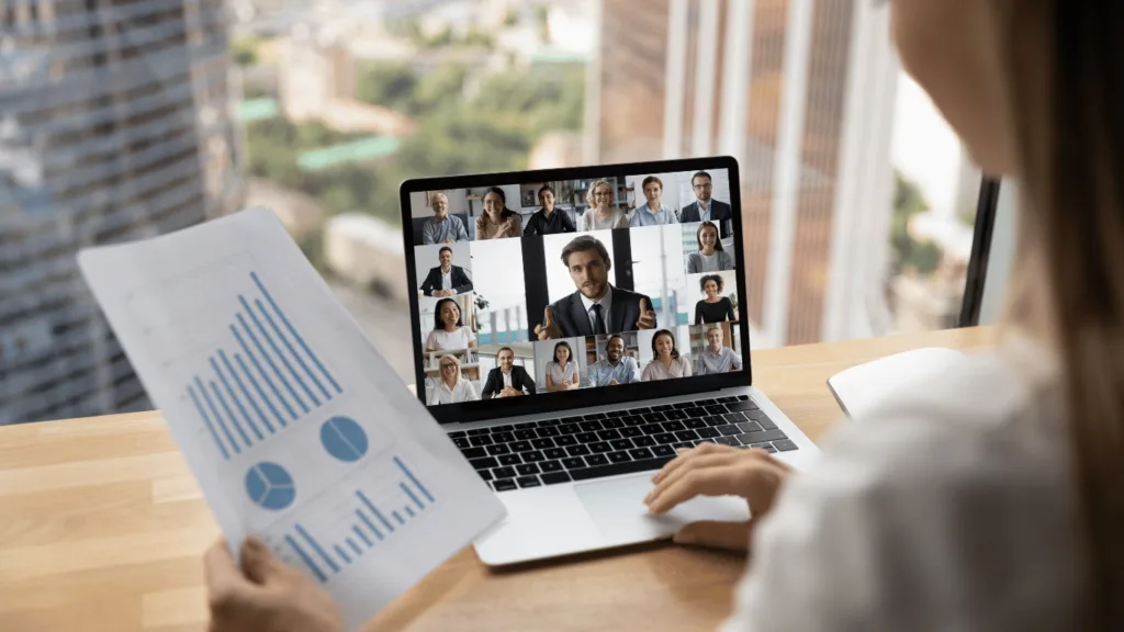 Customer support team leader meeting entire team to discuss how to enhance customer satisfaction