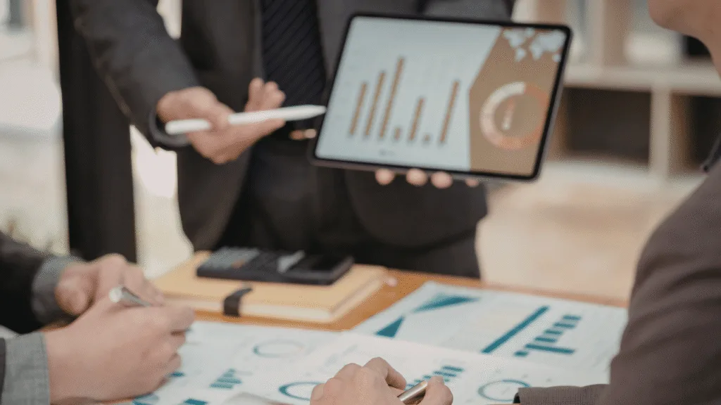 Team discussing and looking at various CX metrics