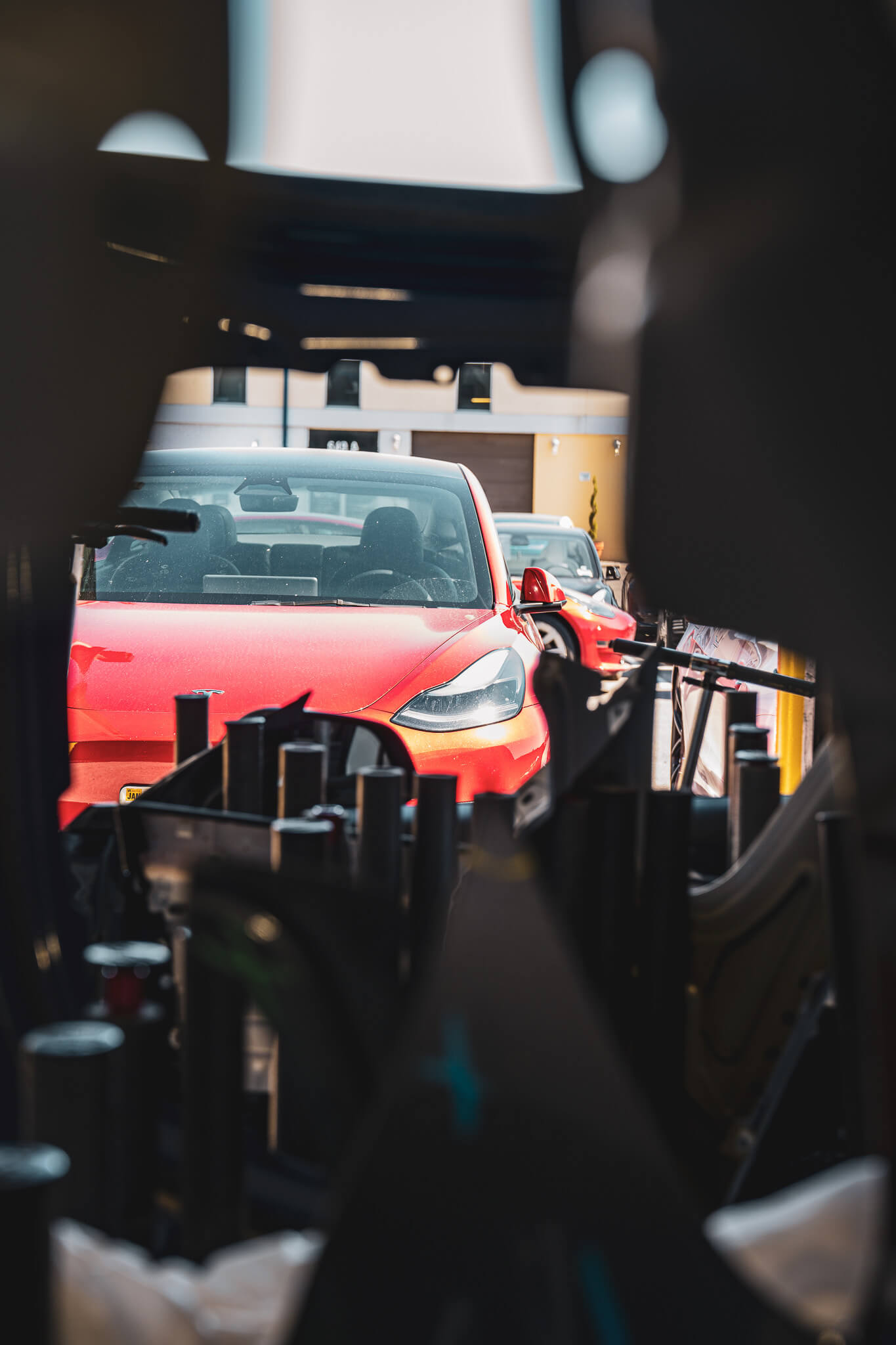 Red Tesla at Total Recon Auto